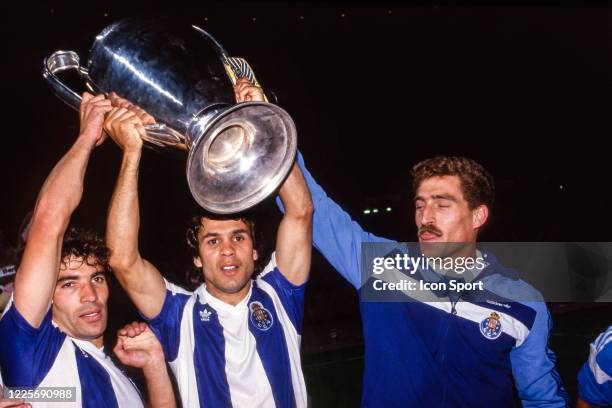 Joao PINTO, Rabah MADJER and Ze BETO of Porto celebrate the victory with the trophy during the European Cup Final match between Bayern Munich and...