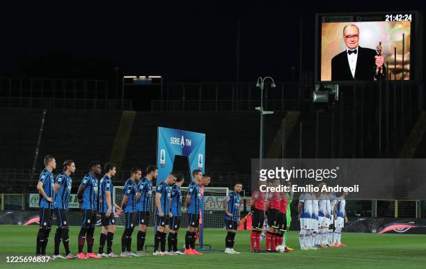 Players and match officials line up to pay their tribute to Ennio Morricone prior to the Serie A match between Atalanta BC and UC Sampdoria at Gewiss...