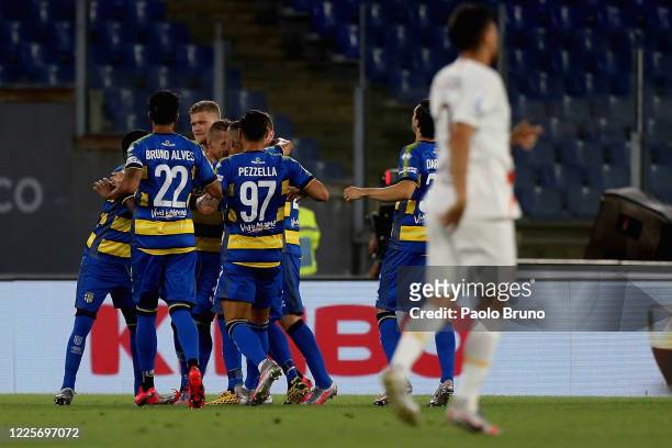 Juraj Kucka with his teammates of Parma Calcio celebrates after scoring the opening goal from penalty spot during the Serie A match between AS Roma...