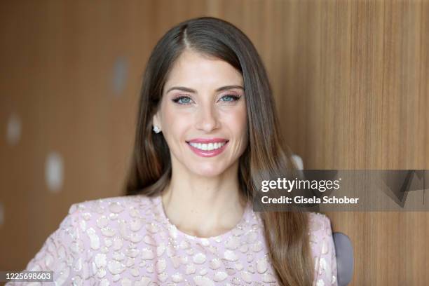 Cathy Hummels poses during a photo shooting at Hotel Bayerischer Hof on July 8, 2020 in Munich, Germany. The German model and influencer Cathy...