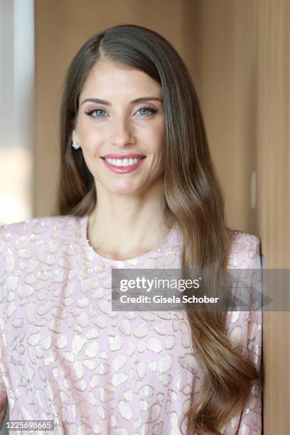 Cathy Hummels poses during a photo shooting at Hotel Bayerischer Hof on July 8, 2020 in Munich, Germany. The German model and influencer Cathy...