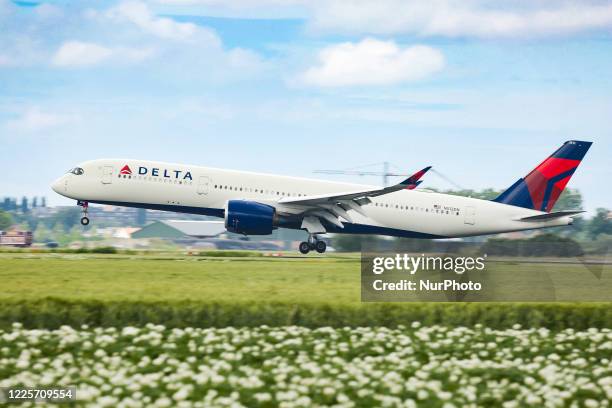 Delta Air Lines Airbus A350-900 aircraft as seen on final approach landing at Amsterdam Schiphol AMS EHAM airport in the Netherlands. The Delta...