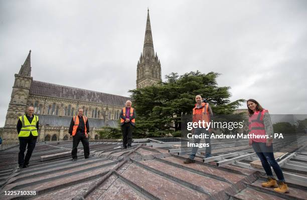 From left to right, James Page of Joju Solar, Robert Titley, Canon treasurer of Salisbury Cathedral, the Rt Rev Nicholas Holtam, Bishop of Salisbury,...