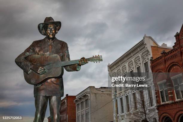 Life-size statue of the famed country music legend, Hank Williams stands where his career started, in the center of the Riverfront Entertainment...