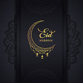 Eid Mubarak Black Background Greeting Design with Beautiful Mandala Art, Golden Moon, Islamic Lantern and Arabic Pattern