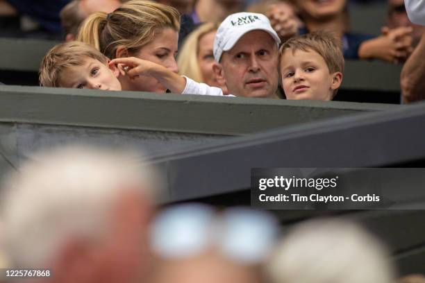 July 08: Mirka Federer, wife of Roger Federer of Switzerland with their sons Leo and Lenny during his match against Matteo Berrettini of Italy on...