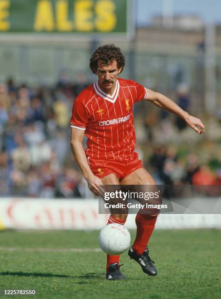 Liverpool player Graeme Souness on the ball wearing the home Crown Paints sponsored shirt during a First Division match against Notts County at...