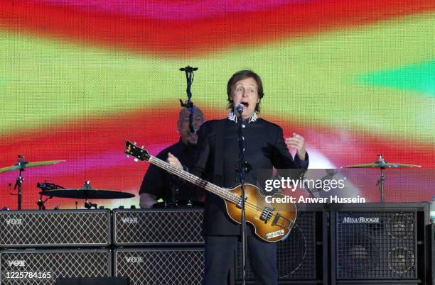 Sir Paul McCartney performs at The Diamond Jubilee Concert in front of Buckingham Palace attended by Queen Elizabeth ll and members of the royal...