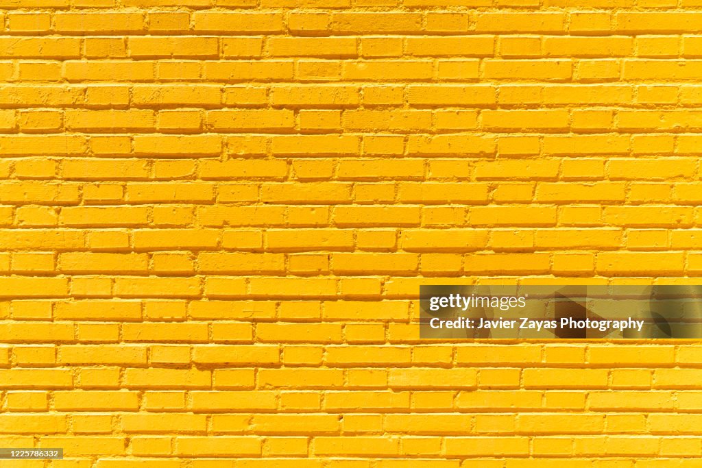 Yellow brick wall background