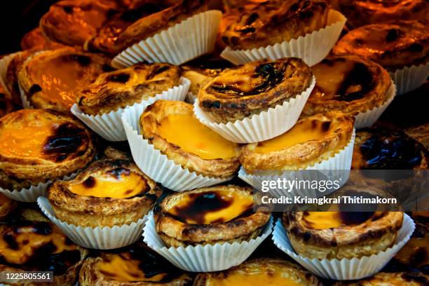 delicious pastel de nata, portugal. - porto portugal food stock pictures, royalty-free photos & images