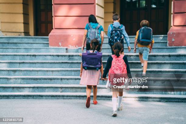 back to school - elementary school building stock pictures, royalty-free photos & images