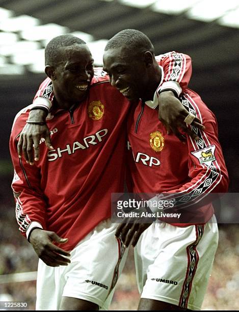Andy Cole of Manchester United celebrates a goal with team mate Dwight Yorke during the FA Carling Premiership match against Newcastle United at Old...