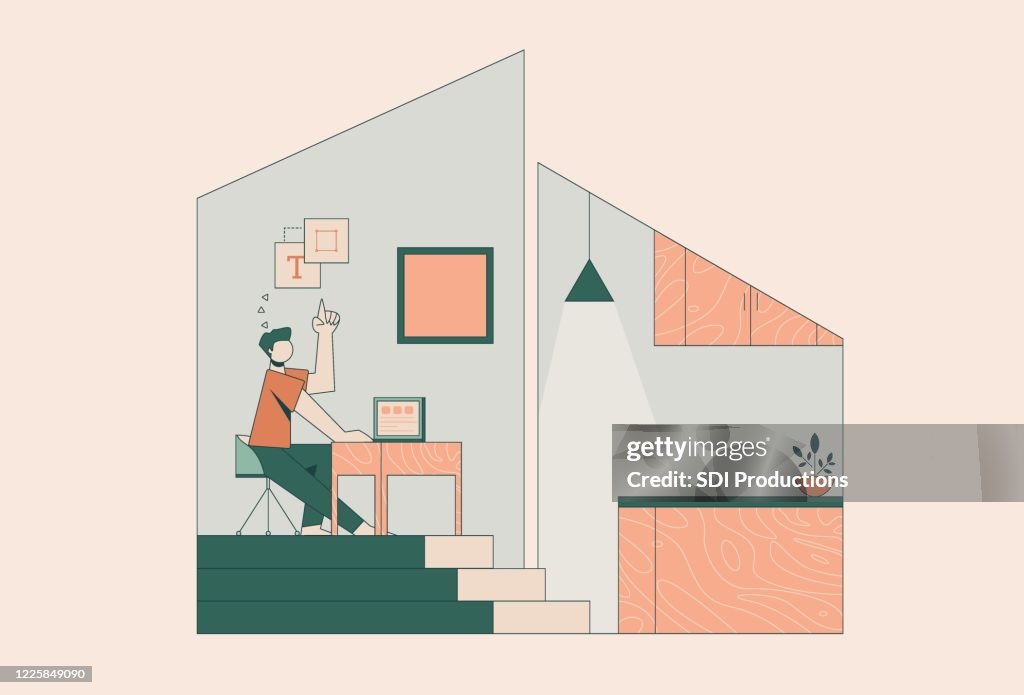 Man telecommuting from home