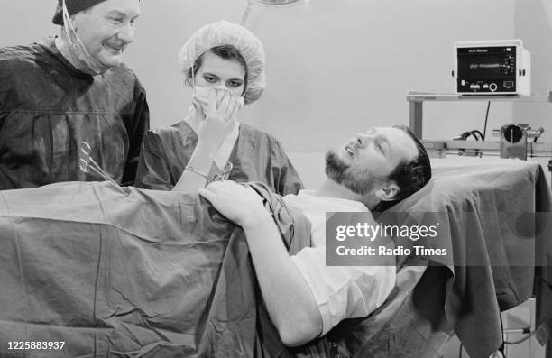 Comedian Kenny Everett and actress Cleo Rocos filming a sketch for the BBC television series 'The Kenny Everett Television Show', January 27th 1983.