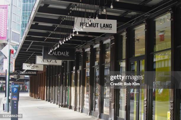 Closed retail stores line a empty street in the Meatpacking District on May 19, 2020 in New York City. COVID-19 has spread to most countries around...