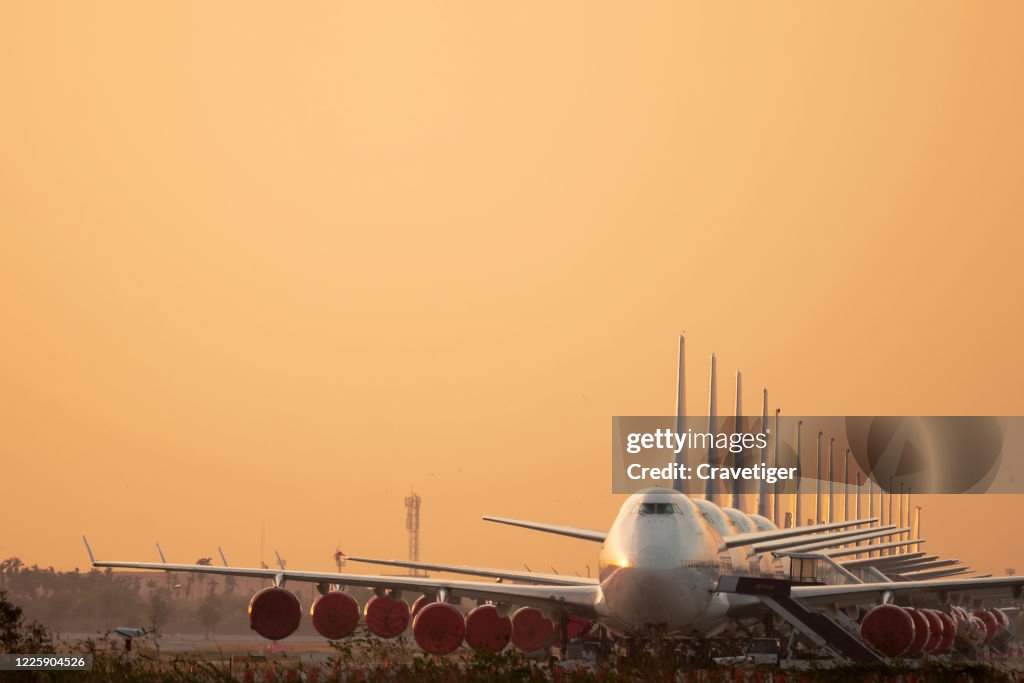 So many airplanes are in line on the runway waiting for take off.These Air Force planes are part of Operation stop service to transport in Covid-19 situation.