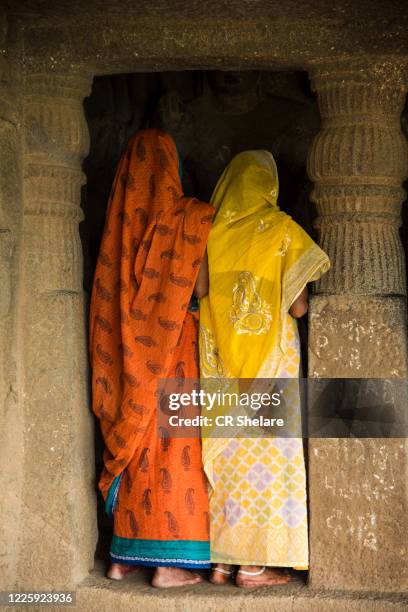 tourist visit to the pandav leni the buddha caves at nashik, maharashtra, india. - nasik caves stock pictures, royalty-free photos & images