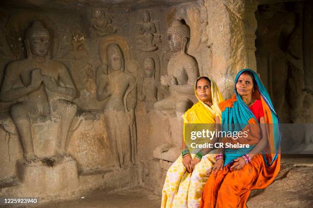 tourist visit to the pandav leni the buddha caves at nashik, maharashtra, india. - nasik caves stock pictures, royalty-free photos & images