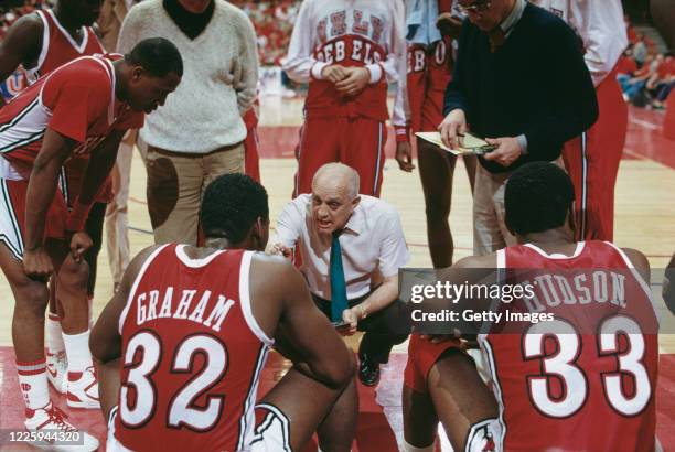 Jerry Tarkanian , head coach for the University of Las Vegas Nevada Rebels talks with Guard Gary Graham and Forward Eldridge Hudson during the NCAA...