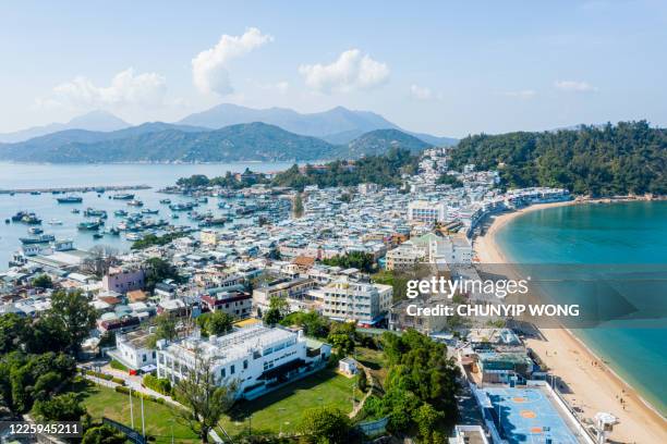 stunning aerial view of the beach and the town in cheung chau island in hong kong, china - cheung chau island stock pictures, royalty-free photos & images