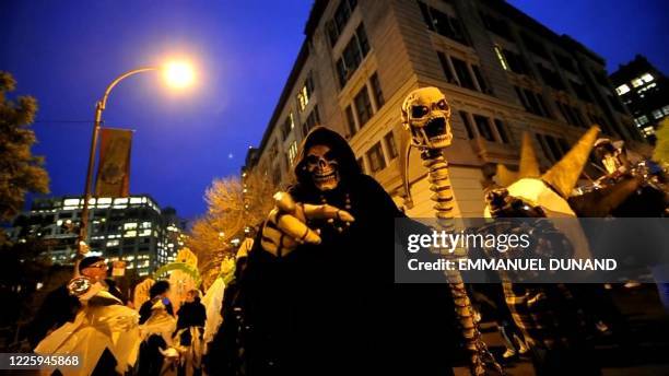 Thousands of New Yorkers descend onto the streets to take part in the annual Halloween parade in Greenwich village, New York on October 31, 2011.