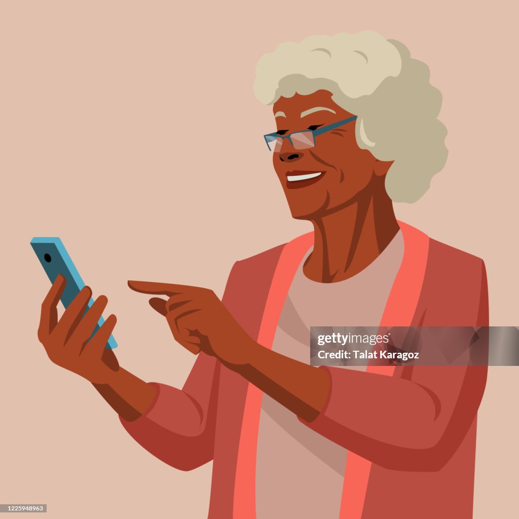 African American grandmother holding smartphone