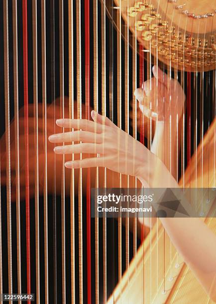 harp performance - harp stock pictures, royalty-free photos & images