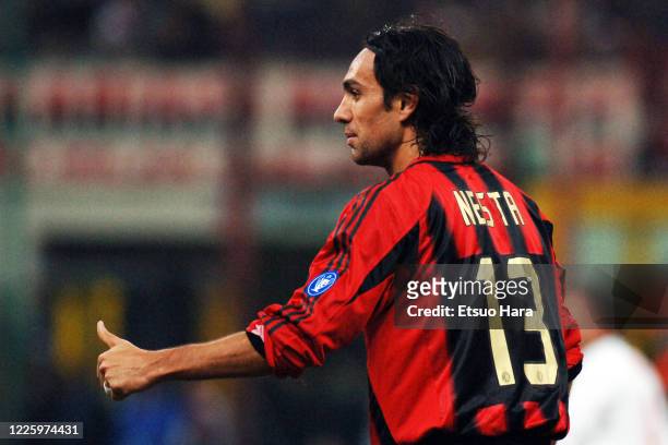 Alessandro Nesta of AC Milan thumbs up during the UEFA Champions League Round of 16 second leg match between AC Milan and Manchester United at the...