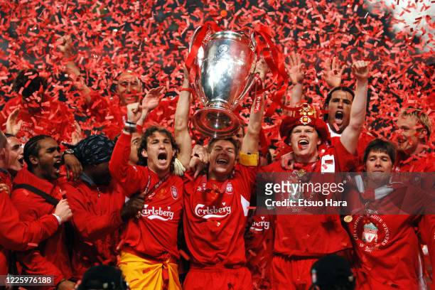 Captain Steven Gerrard of Liverpool lifts the trophy at the ceremony following the UEFA Champions League final between AC Milan and Liverpool at the...