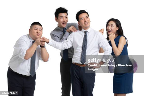 bossy chinese businessman being flattered - massage funny stock pictures, royalty-free photos & images