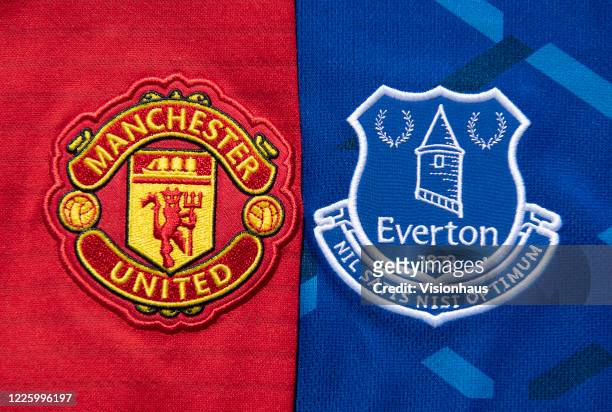 The Manchester United and Everton club crests on their first team home shirt on May 13, 2020 in Manchester, England.