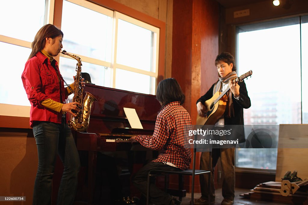 People Instruments Young People Playing Instruments High-Res Stock Photo - Getty Images