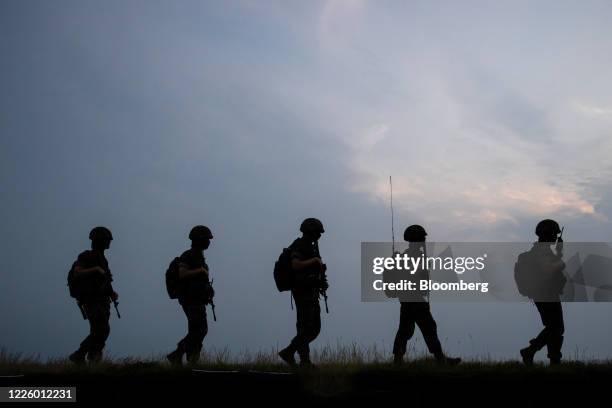 South Korean Marine Corps soldiers patrol Guridong beach on Yeonpyeong Island, South Korea, on Friday, June 26, 2020. On the sleepy island of...