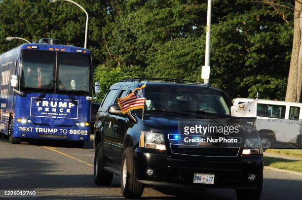 Vice President Mike pence waves at his supporters as he passes by in his campaign motorcade in Philadelphia, PA, on July 9, 2020.