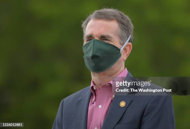 Virginia Governor Ralph Northam wearing a mask, was on hand to watch the set up of the testing for covid-19 in a shopping center that services an...