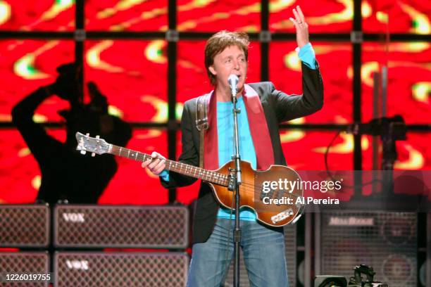 Paul McCartney and his band perform at the Capital One Arena on October 8, 2005 in Washington, DC.