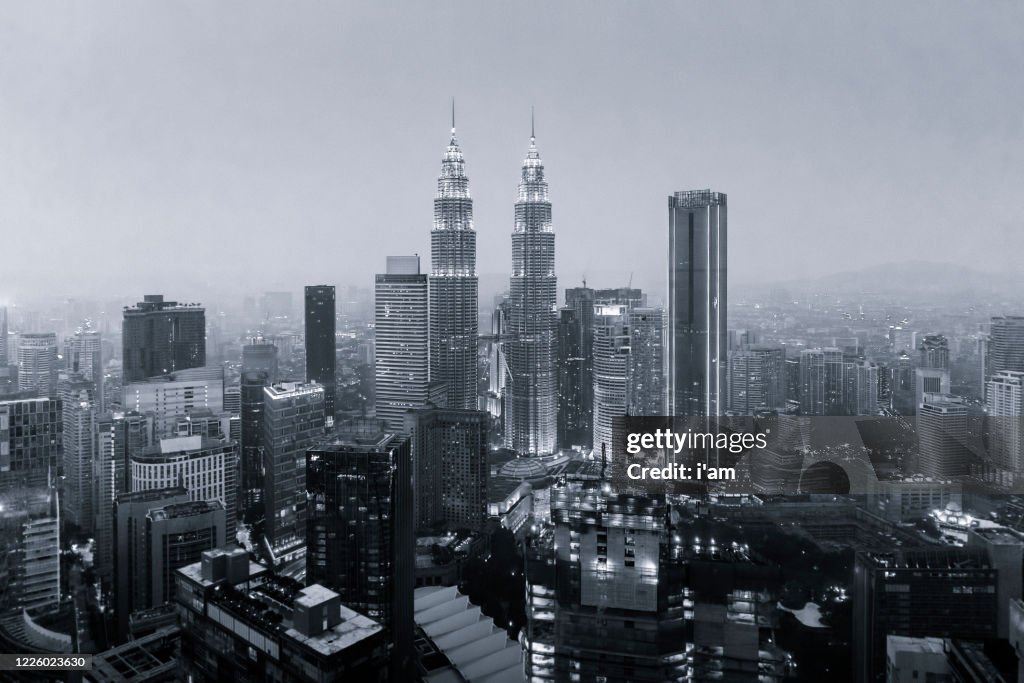 Black and white scenery of the Kuala Lumpur city. Architecture building exterior city.
