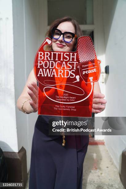 Deborah Frances-White poses with "The Spotlight" award for 'The Guilty Feminist' podcast during the 2020 British Podcast Awards on July 11, 2020.