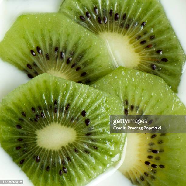 kiwi yogurt closeup - kiwi fruit stock pictures, royalty-free photos & images