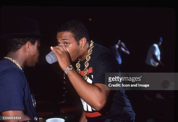 Run-DMC's DJ Jason 'Jam Master Jay' Mizell and Joseph 'Run' Simmons perform during the Together Forever Tour on July 29 at the Pine Knob Music...