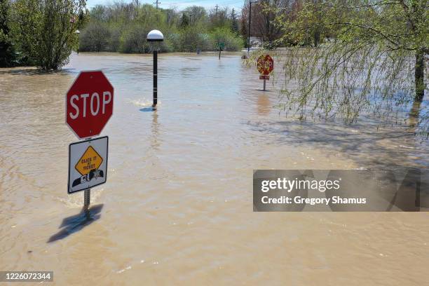 View of floodwaters flowing from the Tittabawassee River into the lower part of downtown Midland on May 20, 2020 in Midland, Michigan. Thousands of...