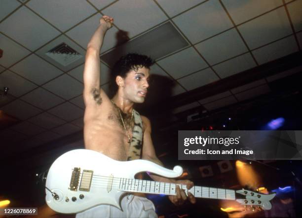 American singer, songwriter, musician, record producer, dancer, actor, and filmmaker Prince performs during what is essentially a public rehearsal...