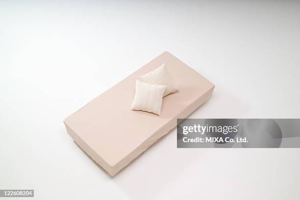 single sized bed and cushions - bed on white background stock pictures, royalty-free photos & images