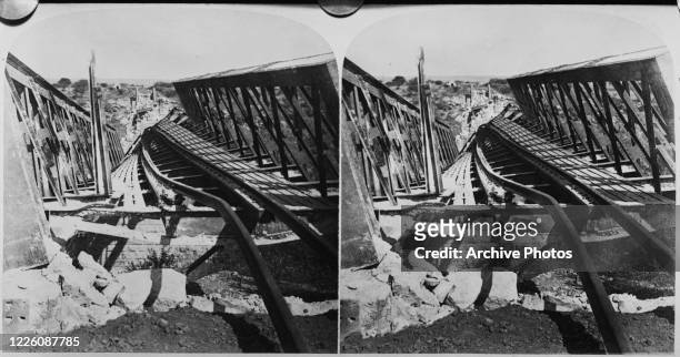 The wreckage of a railway bridge over the Valsch River near Kroonstad, in the Free State of South Africa, after it was blown up by the Boers during...