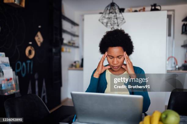 young african american woman struggling to find a job - working from home stress stock pictures, royalty-free photos & images