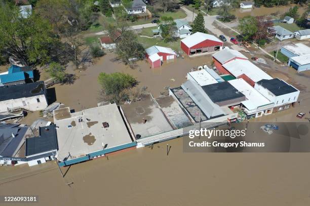 Aerial view of main street that is flooded after water from the Tittabawassee River breached a nearby dam on May 20, 2020 in Sanford, Michigan....