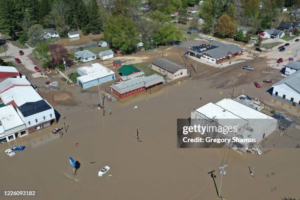 Aerial view of main street that is flooded after water from the Tittabawassee River breached a nearby dam on May 20, 2020 in Sanford, Michigan....