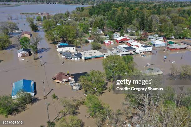 Aerial view of main street that is flooded after water from the Tittabawassee River breached a nearby dam on May 20, 2020 in Sanford, Michigan....