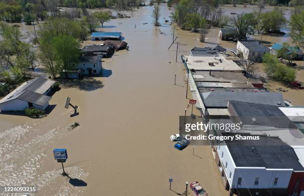 Aerial view of main street that is flooded after water from the Tittabawassee River breached a nearby dam on May 20, 2020 in Sanford, Michigan....
