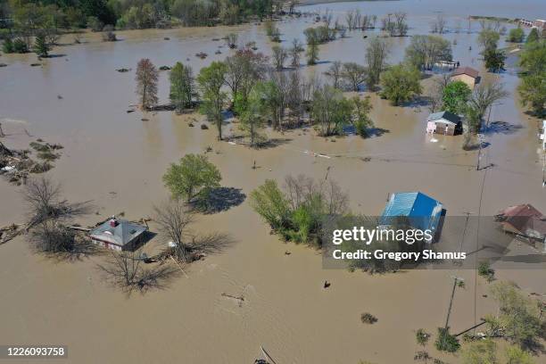 Aerial view of the Tittabawassee River after it breached a nearby dam on May 20, 2020 in Sanford, Michigan. Thousands of residents have been ordered...